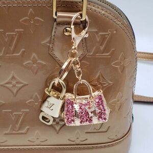 100% Auth Louis Vuitton Lock & Key with unbranded Bagcharm, Keycharm, Keychain